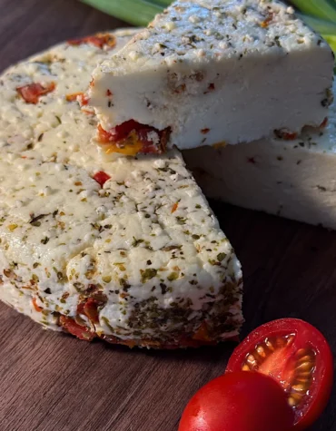 Adyghe cheese with Provencal herbs and sun-dried tomatoes